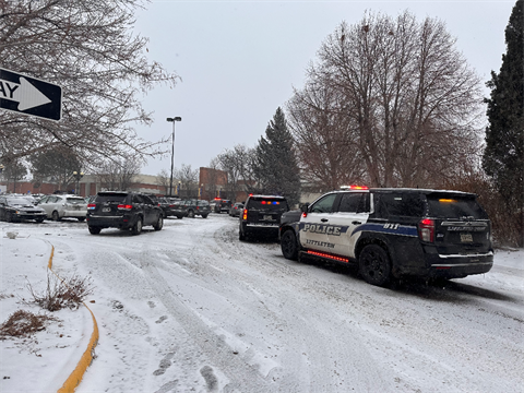Police cars in front of Littleton High School