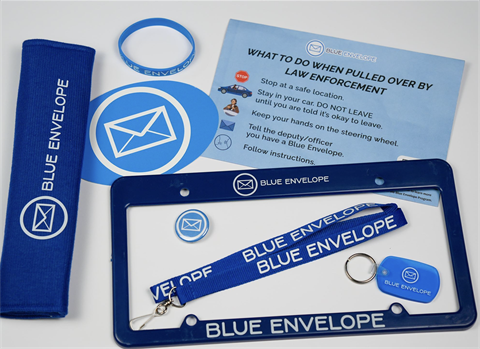 Photo of Blue Envelopes and handouts