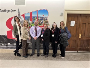 Representatives from Littleton PD, Greenwood Village PD, and the Arapahoe County 911 Authority, along with the Authority lobbyist.